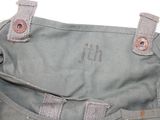 a bag that has some buttons on it