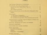 an old book with a list of items on it sitting on a table