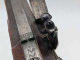 a close up of a rifle with a gun in it
