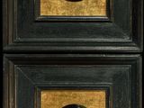 two framed pictures of a building and a building on a black background