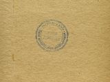 an old book with a stamp on the front of it