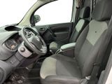 the interior of a small car with a steering wheel and dashboard