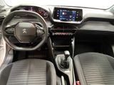 the interior of a car with a steering wheel and dashboard controls