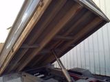 a truck with a flat bed on the back of it