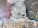 un tableau représentant un bébé endormi sur un oreiller