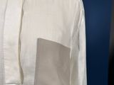 a close up of a white shirt on a mannequin mannequin mannequin mannequin mannequin mannequin mannequin manne