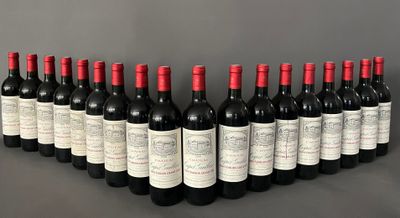 a group of bottles of wine lined up in a row