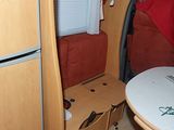 a small table in the back of a camper