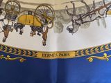 a scarf with a picture of a group of people riding on a horse drawn carriage