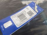 a tag that is attached to the back of a cell phone