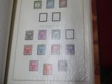 a picture of a book with a lot of stamps on it