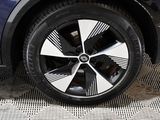 a close up of a wheel on a car