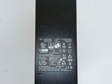 the back side of a laptop with a battery in it