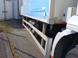 a truck that is parked on the side of the road