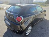 a picture of a small car that has been badly damaged