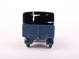 a blue toy truck with a black top on a white surface