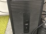 a close up of a desktop computer with a mouse on top of it