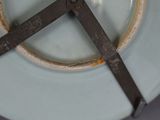 a close up of a plate with a cross on it