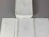 two napkins that are folded on top of each other