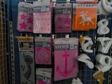 a rack with various items for sale in a store