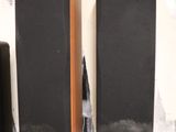 two speakers that are sitting on top of a table