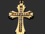 un gros plan d'une croix en or ornée de perles sur fond noir