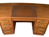 an image of a wooden desk with drawers and a glass top