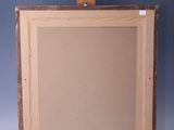 an old painting on a wooden easel against a blue wall