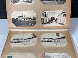 an old photo of an open book with pictures of buildings and people
