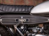 a close up of a motorcycle with the number 350 on it