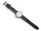 brown leather watch strap with white dial on a white background