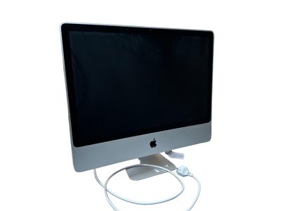 a computer monitor with a power cord attached to it