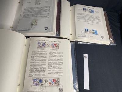 three open books sitting on top of a table next to each other