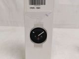 a close up of a box with a watch inside of it
