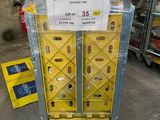 a cart that has a sign on it in a warehouse