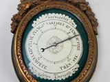 a clock that is hanging on the wall in the room