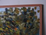 a painting hanging on the wall of a room