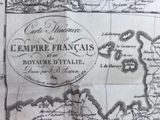 an old map of the empire of france with a map of the country