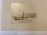 an old photo of a boat in the water