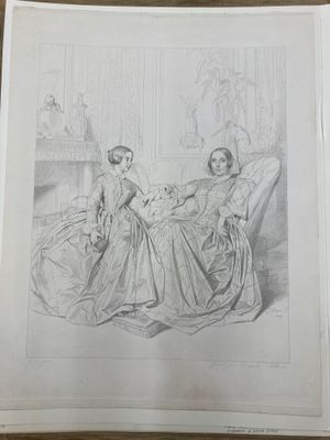 une image représentant deux femmes assises sur un canapé