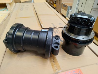 two different types of hydraulic parts on a table