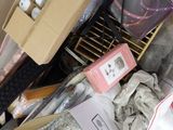 a box full of stuff that is sitting on the floor
