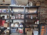 many boxes and boxes on the shelves in the room