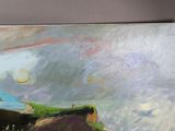 a painting on the wall of a room with a view of the ocean