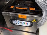 a machine that is sitting on a counter in a kitchen