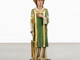 a statue of a man in a green robe and hat