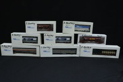 a lot of boxes of toy trains sitting on a table