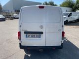 a white van that is parked in a parking lot