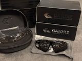 two pairs of gatorz sunglasses in a case