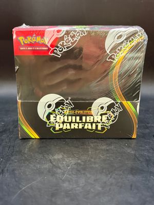 the box of the pokemon trading card game is sitting on the table